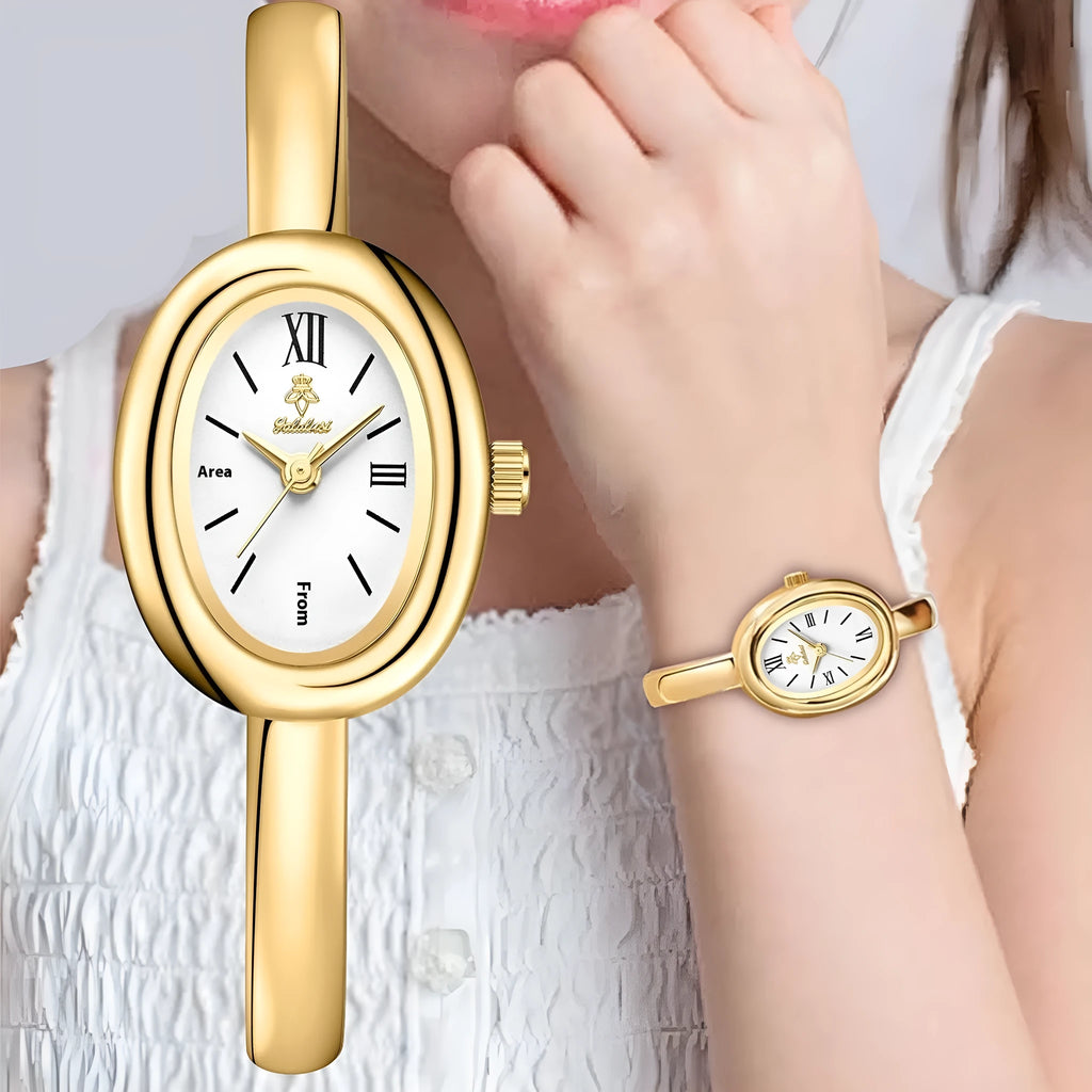 Women's oval retro quartz watch in gold colour with spiral pattern on 8mm slim case