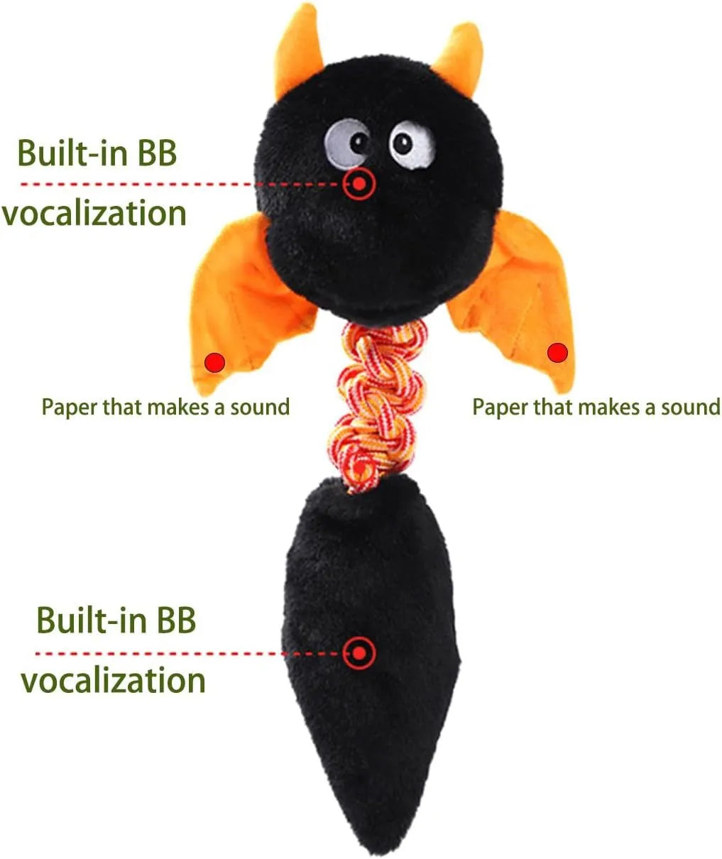 Large green plush dog toy with cartoon shape, shown next to a red version, on a white background.