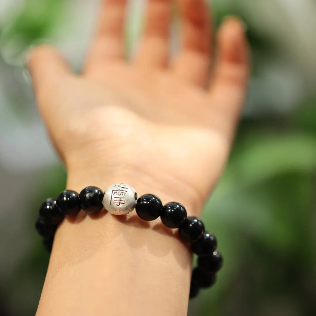Women's black agate bracelet with 10mm beads and sterling silver clasp