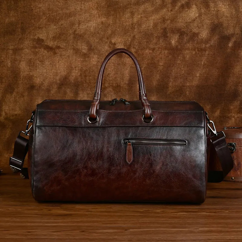 Handmade retro style leather bag in vintage brown made from top-grain cowhide.