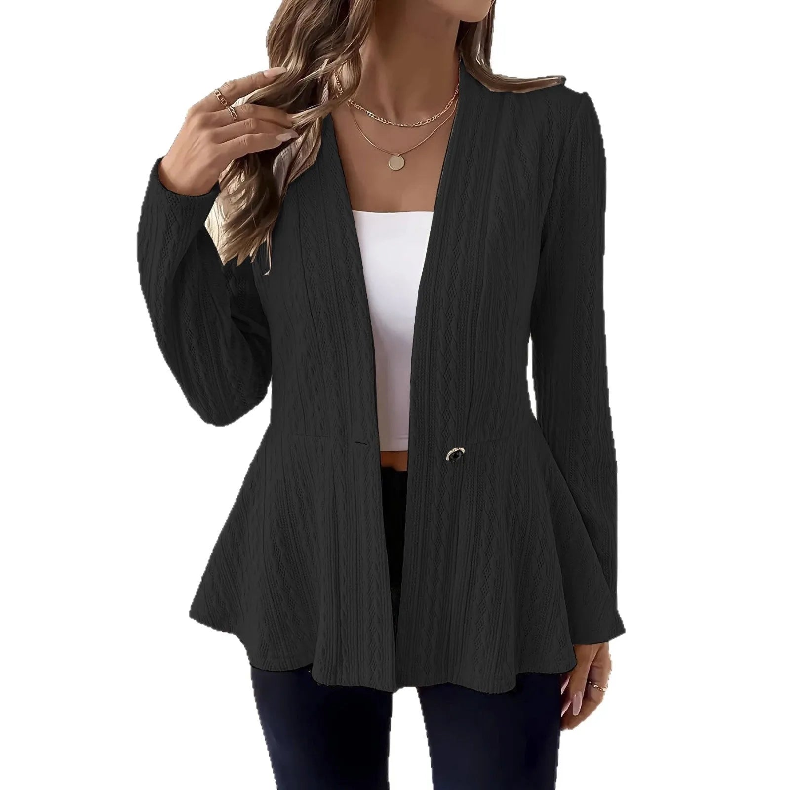 Women's apricot jacquard knit cardigan with one button, shown on a model.