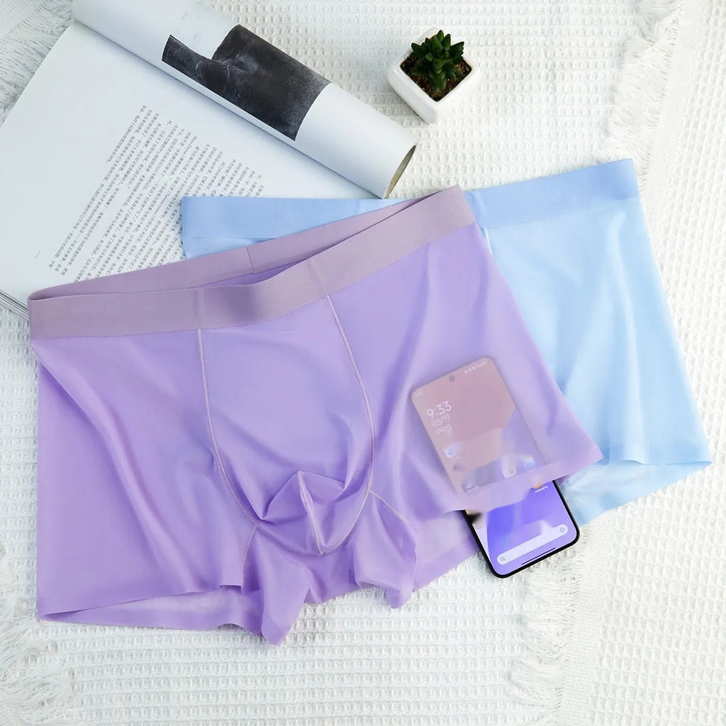 Men's ultra-thin ice silk boxer briefs in seamless design on a white background.