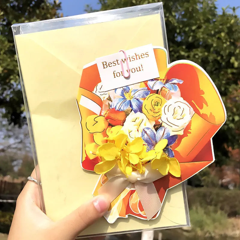 Handmade 3D butterfly-shaped birthday card with artificial flowers and hot foil stamping details.