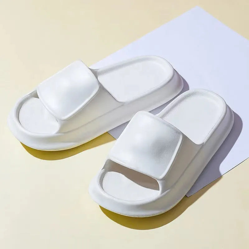 EVA flip-flop slippers with thick sole in assorted colours on a white background.