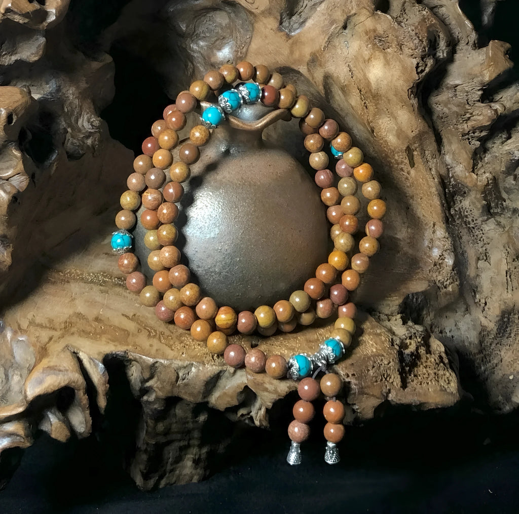 Handmade stone bead bracelet with 108 geometric lvzhu beads measuring 5-6mm