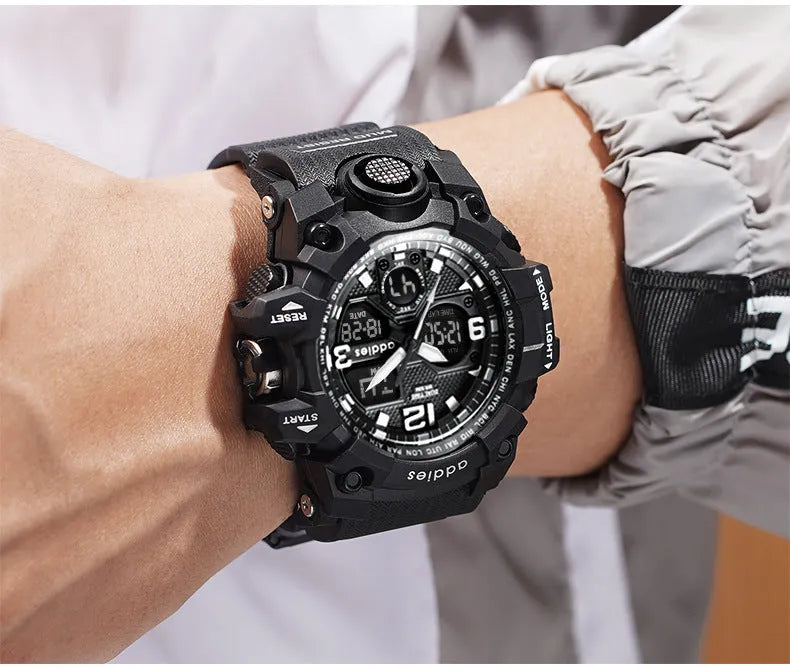 Men's white and black dual display electronic sports watch with plastic strap on wrist