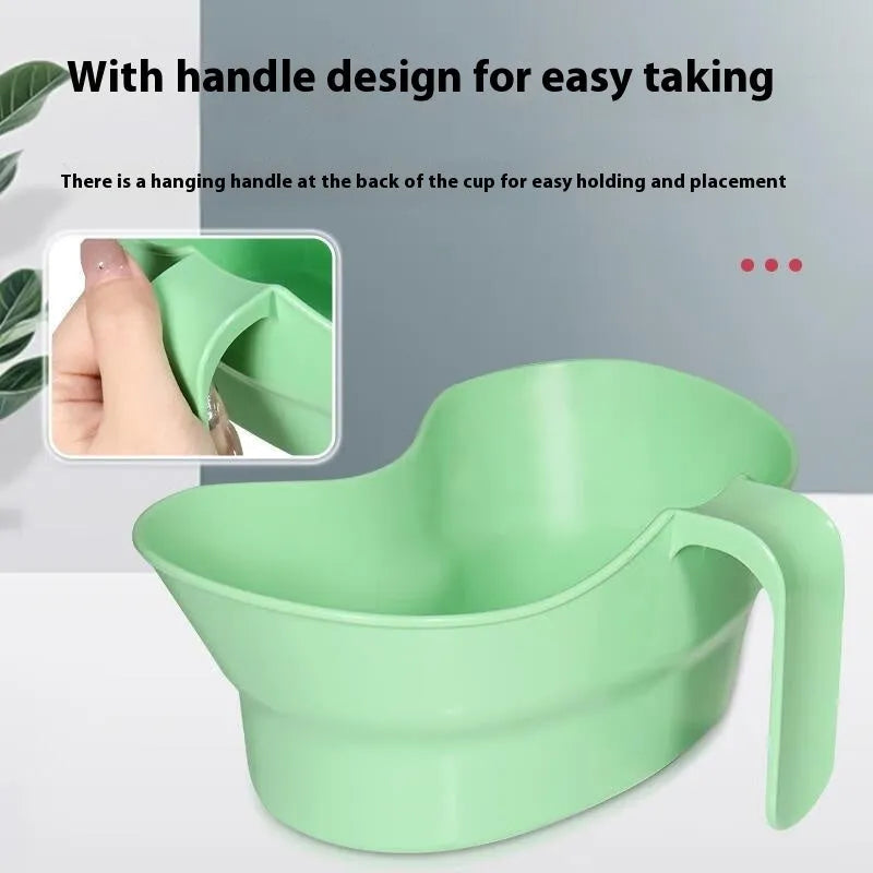 Green plastic nursing gargle cup with white lid for bedside oral care
