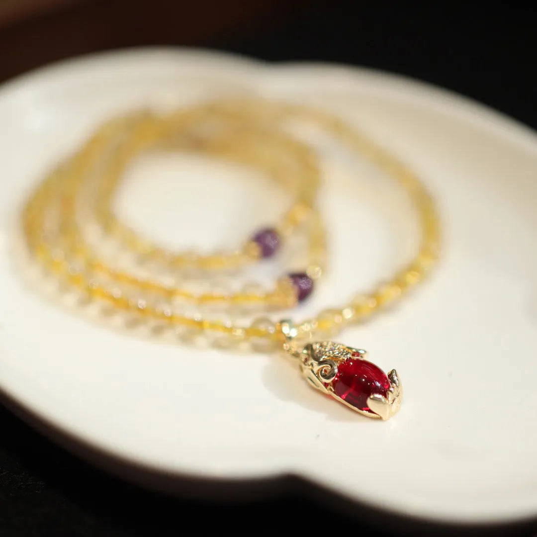 Brazil gold rutilated quartz bracelet with three golden circles and ruby quartz hanging chopsticks