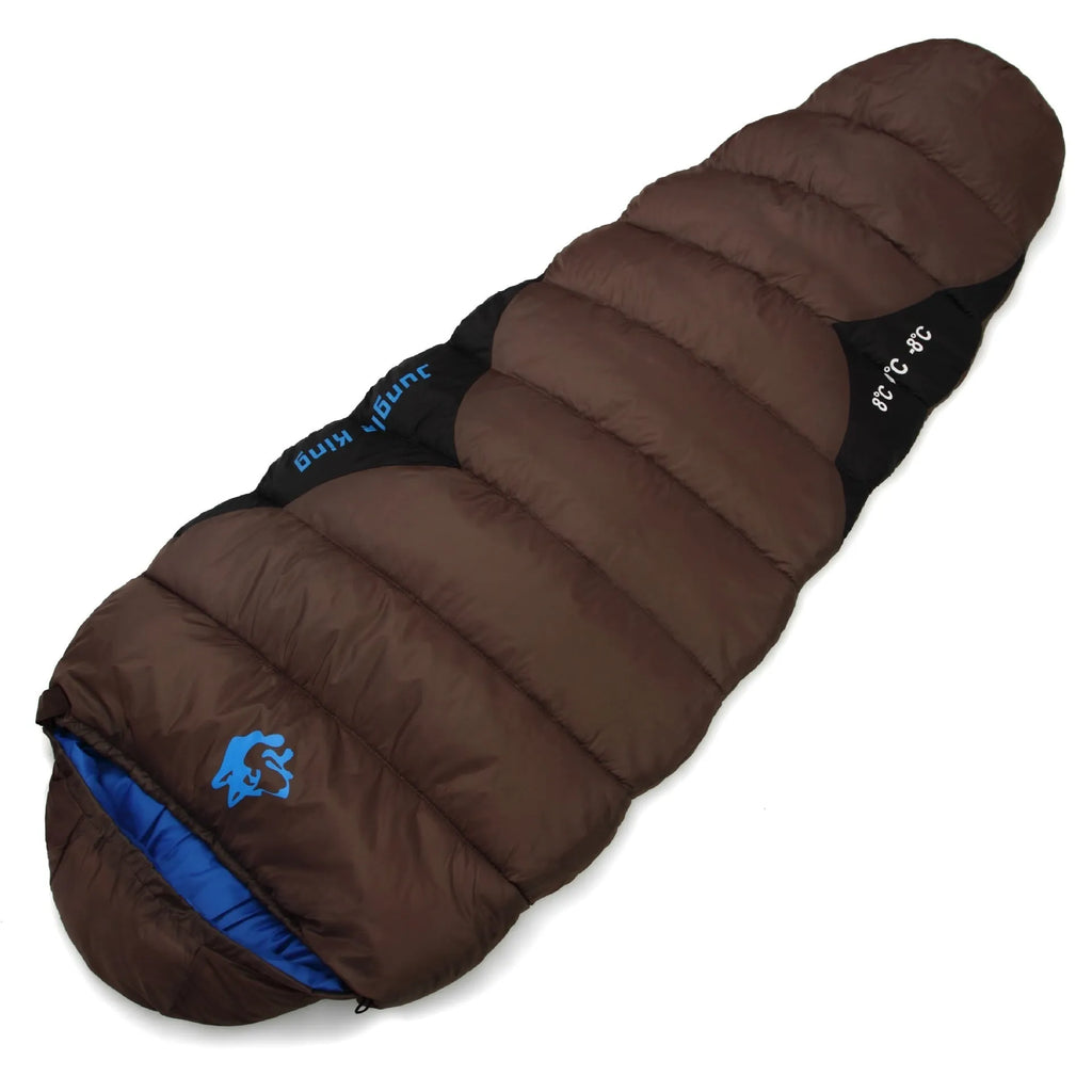 Cotton sleeping bag in Army Green colour with its compression sack, sized for outdoor camping.