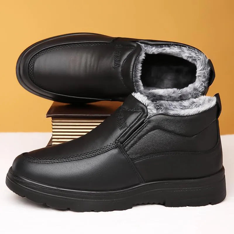 Men's black and brown fleece-lined winter slip-on shoes with a non-slip rubber sole.