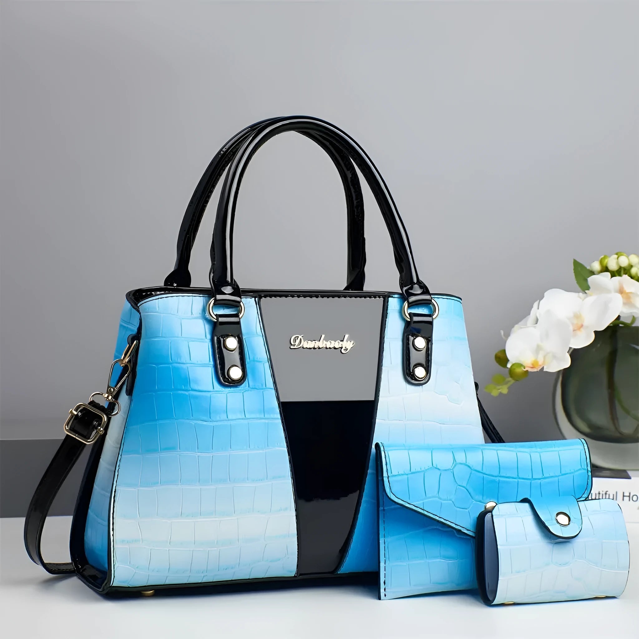 Women's three-piece shoulder bag set with crocodile stitching showing main bag, small bag, and card bag