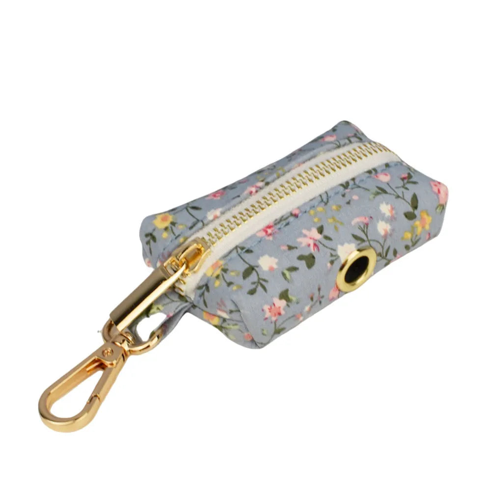 Blue floral polyester cotton dog collar set with leash, bow, vest and poop bag accessories