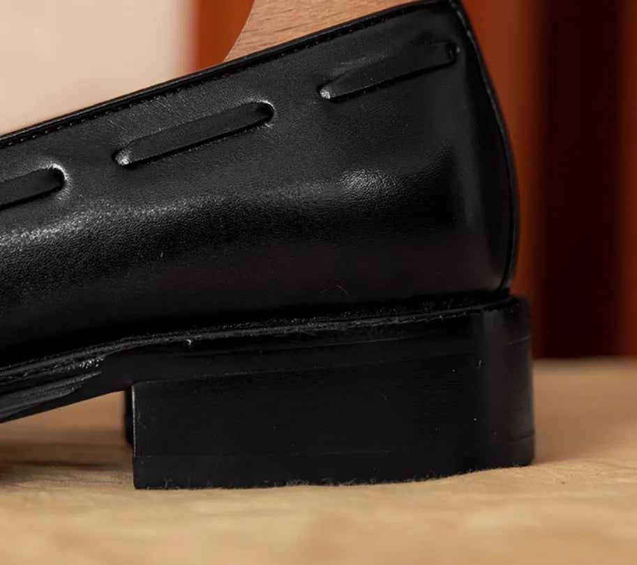 Men's black genuine leather slip-on loafers with fringed British-style design