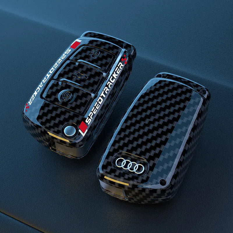 Carbon fibre style car key cover with mirror accent in carbon and white colour options