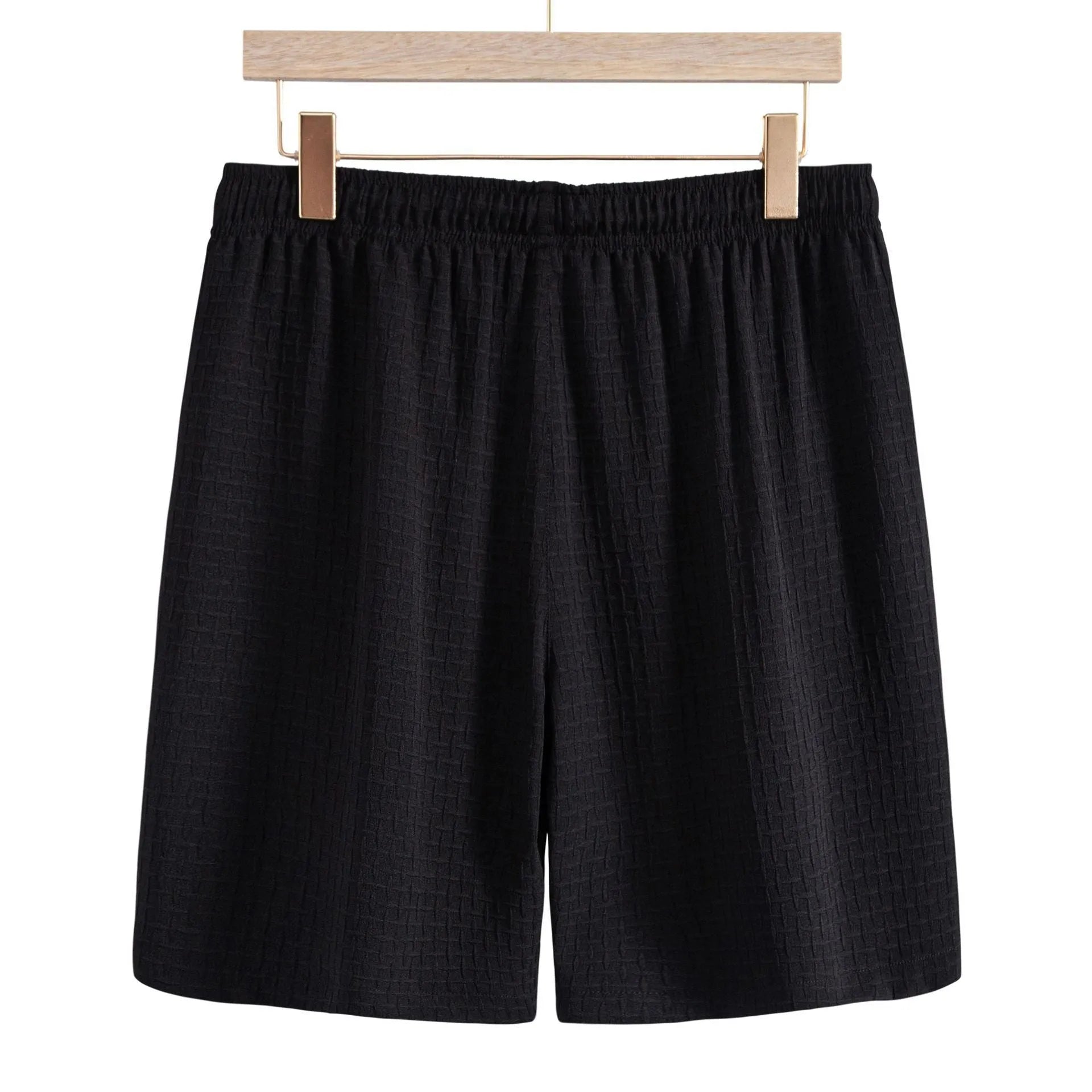 Men's black casual summer shirt and shorts suit with short sleeves on hanger