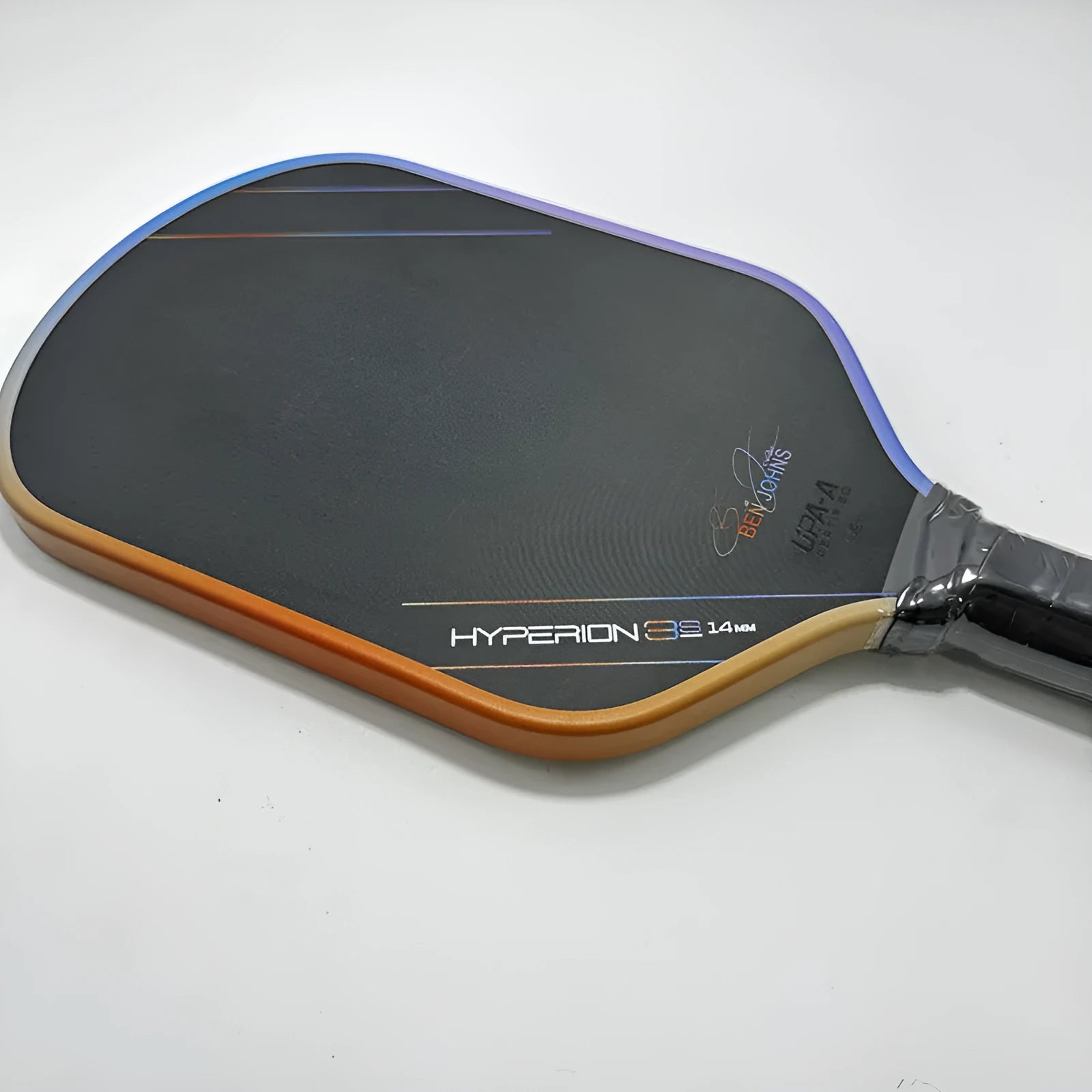 Aurora Hyperion pickleball racket with multicolour carbon fibre face and graphite matte finish.