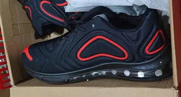 Men's black casual sneakers with lace-up front and air cushion design