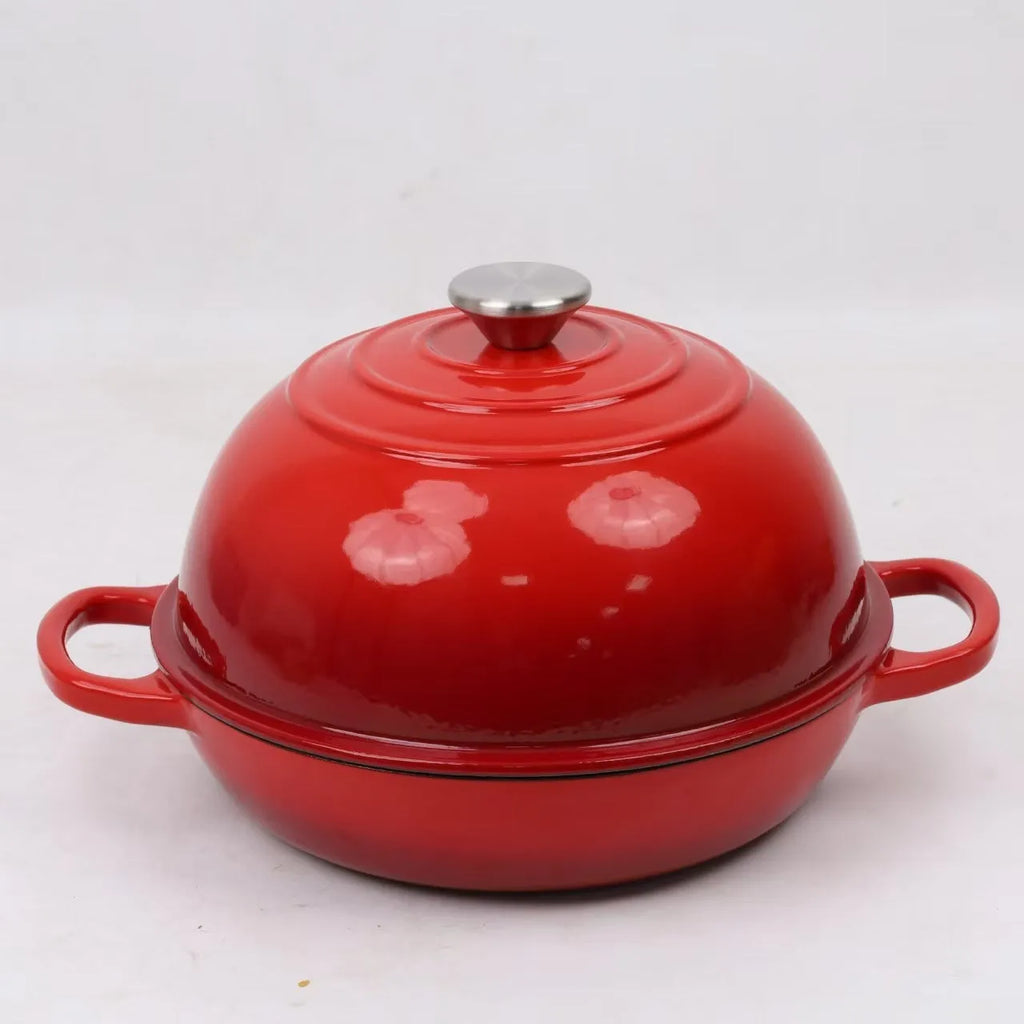 Black cast iron enamel bread pot on a surface, available in 24cm and 26cm sizes