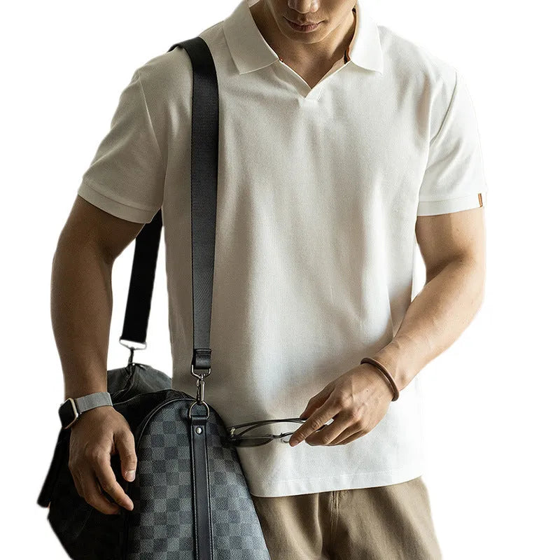 Men's short-sleeve cotton polyester polo shirt in blue, black and white colours showing regular fit design