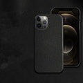 Brown genuine leather half-wrap protective case on an iPhone 14 Pro Max.