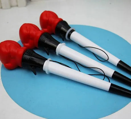 Set of four pressure relief pens with boxing press ejection mechanism and black 0.7mm refills