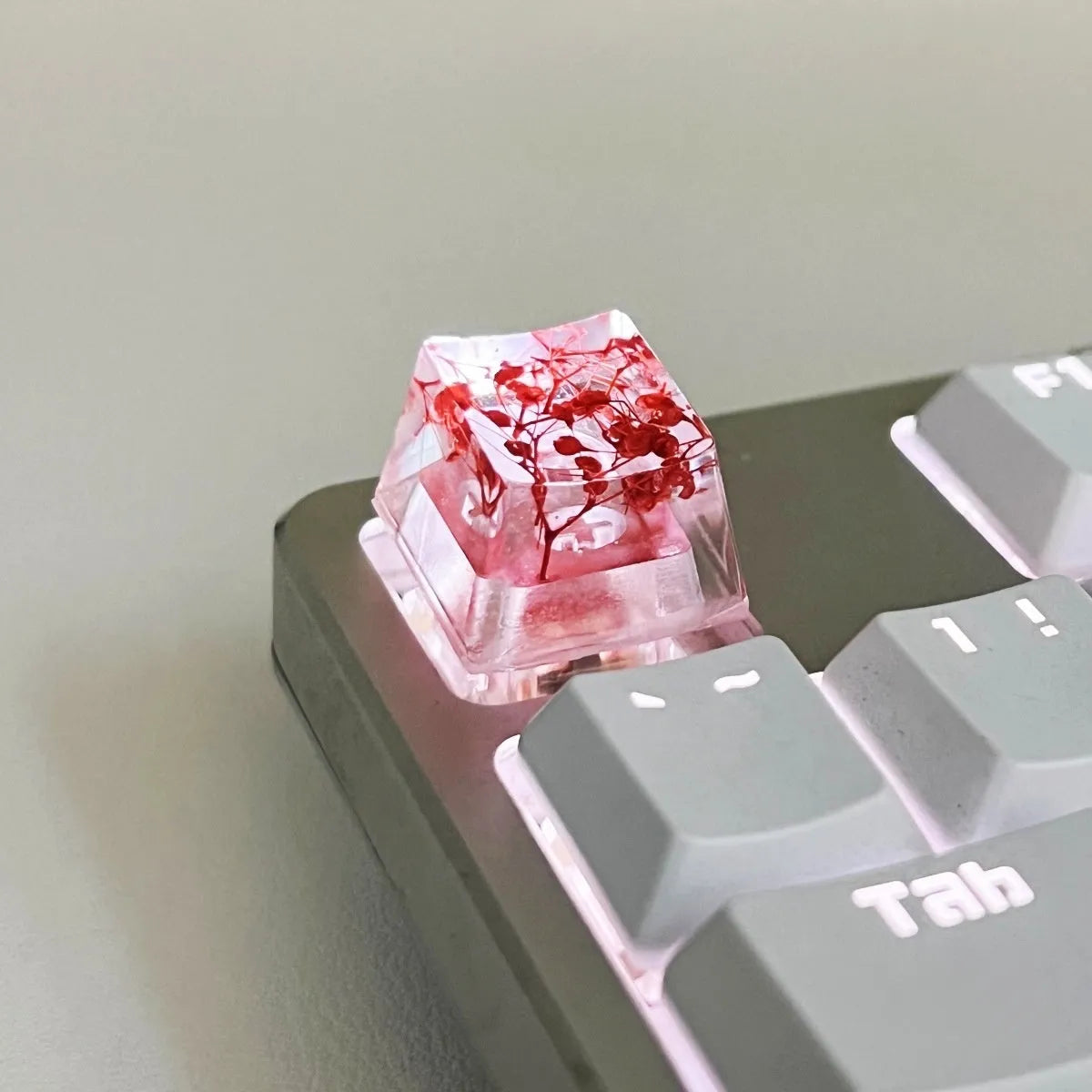 Transparent resin mechanical keyboard keycap with starry sky design in one of four colour options