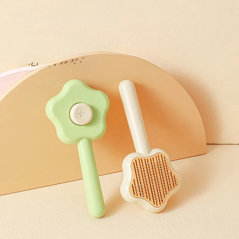 Green self-cleaning cat comb magic wand with stainless steel needles for pet grooming