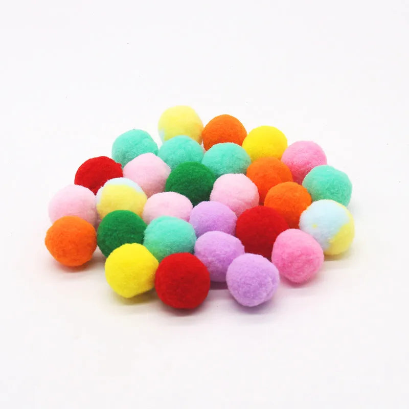 Pet toy ball launcher gun with soft plush yarn balls for interactive play with cats and dogs