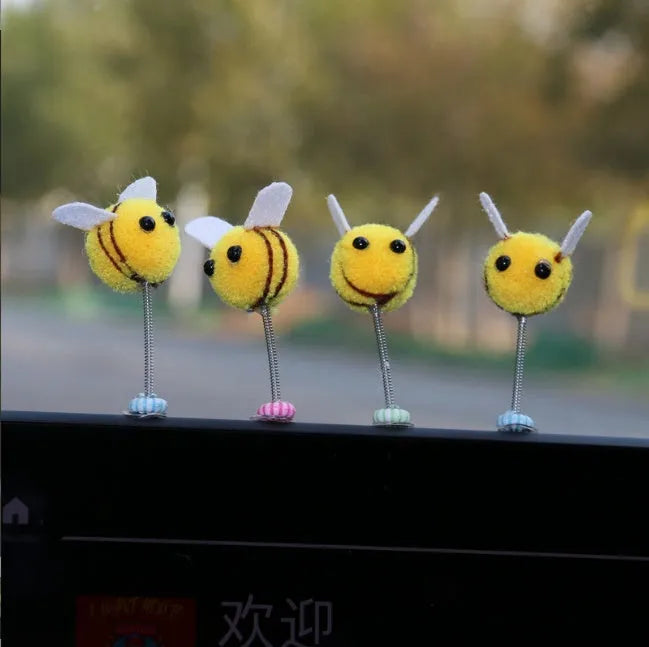 Square fur ball cartoon bee car decoration with black and yellow colours