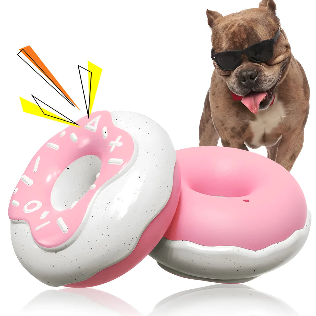 Donut-shaped dog chew toy in pink colour with textured TPR surface for dental cleaning