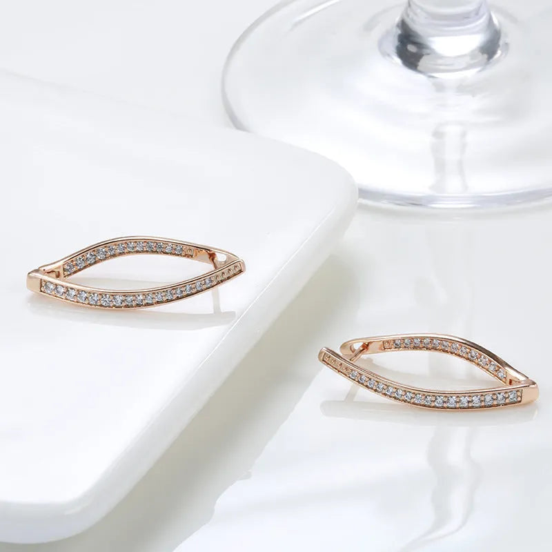 A pair of geometric drop earrings for women made from copper with zircon accents in H0493 colour.