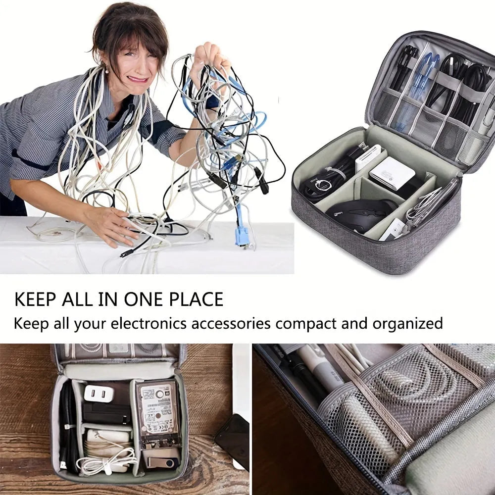 Black travel cable organiser bag open, showing mesh pockets, elastic loops, and removable padded dividers.