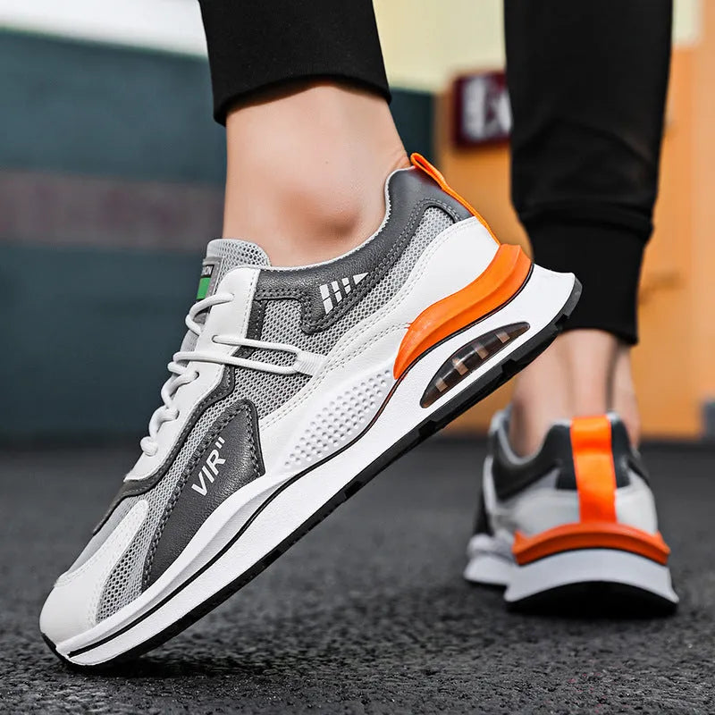 Men's gray mesh running shoes with EVA sole and round toe, shown from side view
