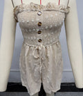 Women's blue off-shoulder jumpsuit with sleeveless design and button details
