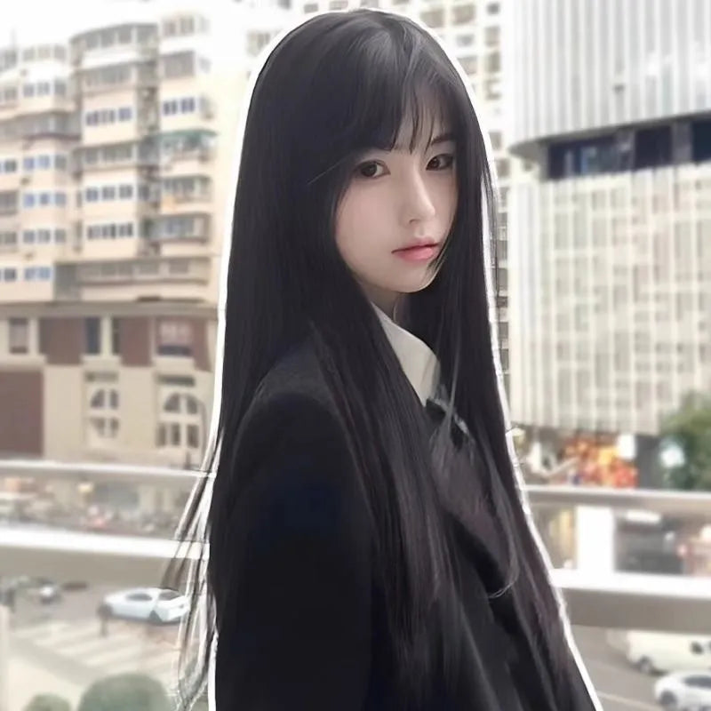Long straight black synthetic wig with bangs on display model