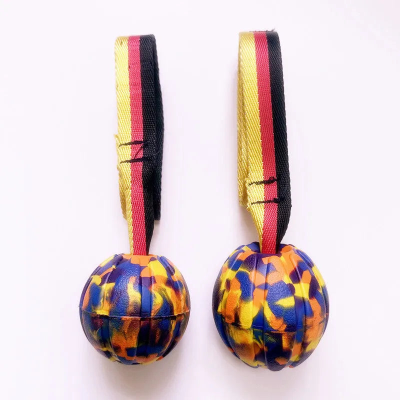 Yellow and camouflage EVA foam floating tetherball dog toys in 6.5cm, 7cm, and 9cm sizes.