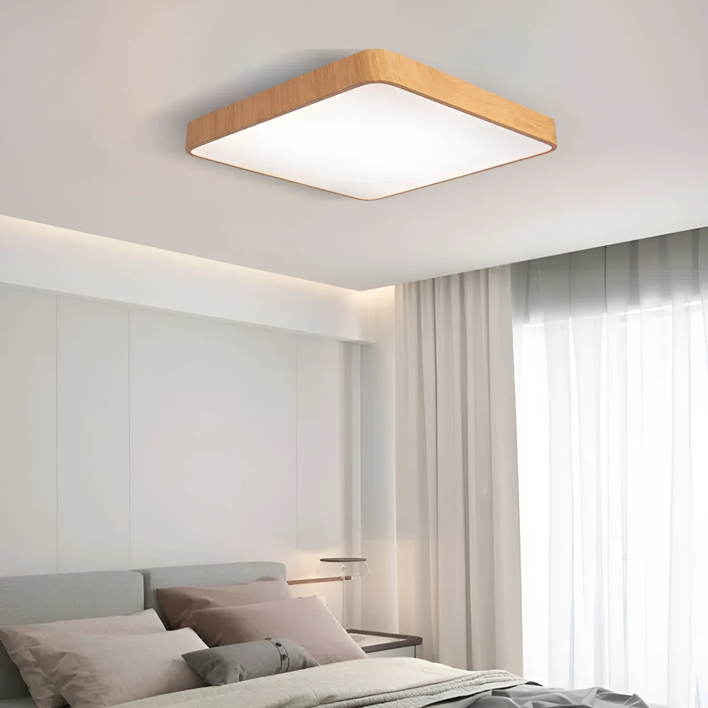 Square modern Nordic LED ceiling light with wood grain finish and iron frame, shown in a bedroom setting.
