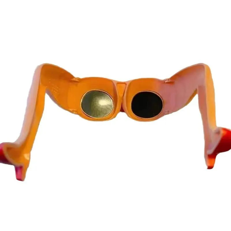 Orange plastic novelty sunglasses with a leg and hip design on the frame