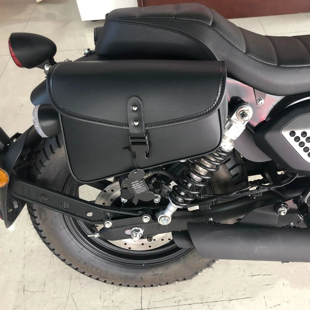 Black PU leather motorcycle swingarm saddlebag for Sportster models showing mounting position
