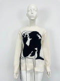 Women's loose grey alpaca wool sweater with tassel design and abstract pattern
