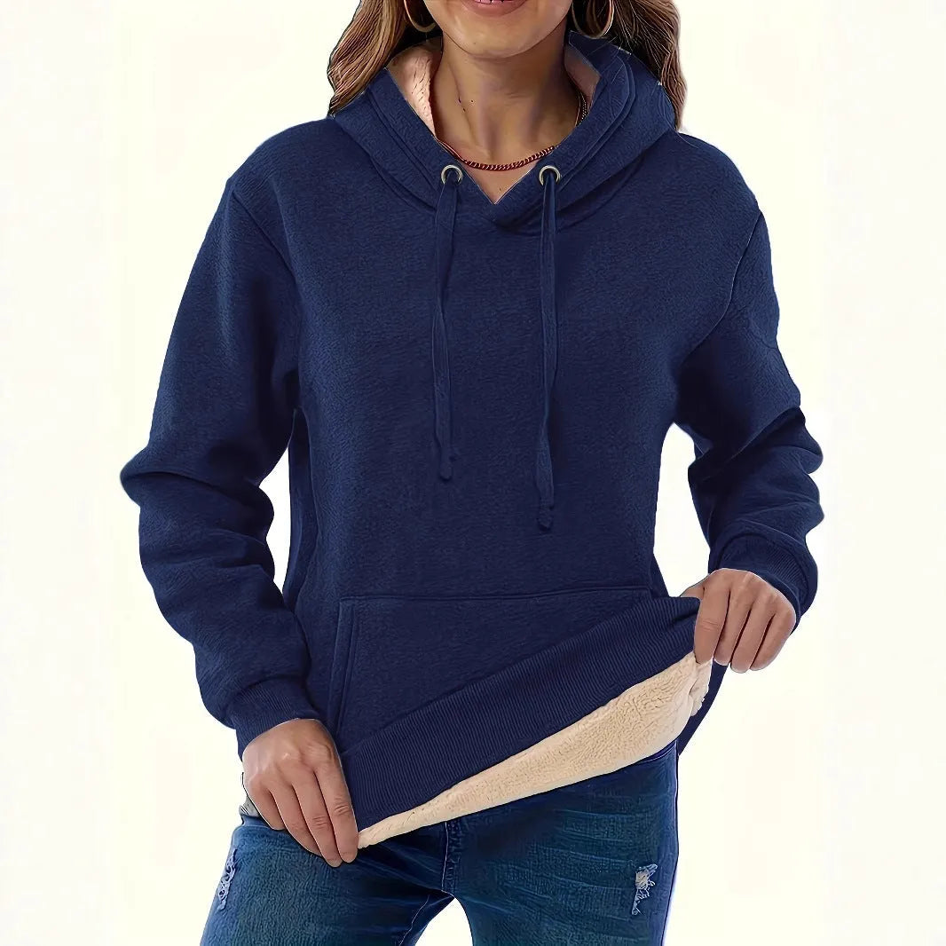 Women's black hooded sweater with a raised 3D pattern, featuring a loose fit and long sleeves.