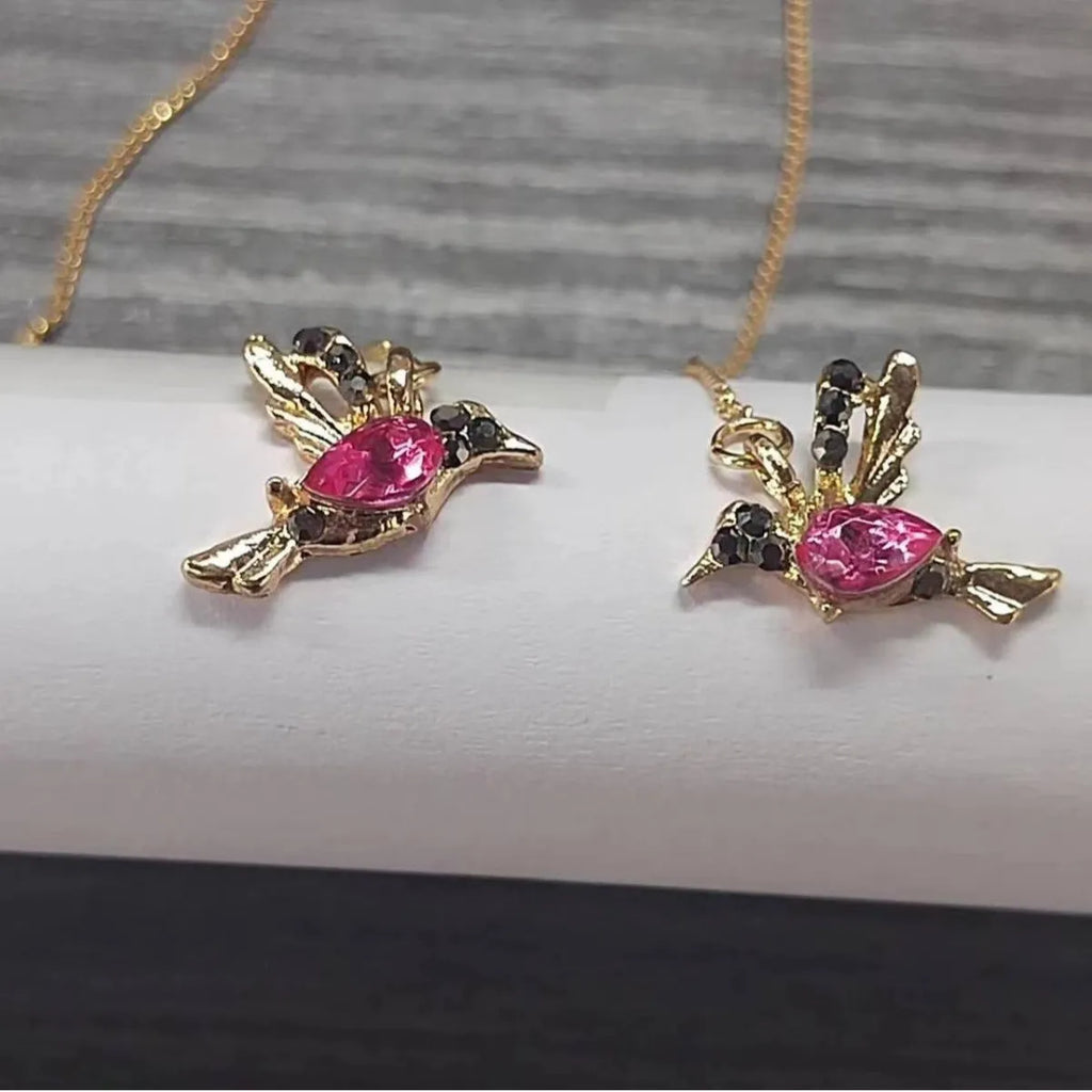 Personalised bird hanging earrings with zirconium wing detail and zodiac animal modelling in long drop style