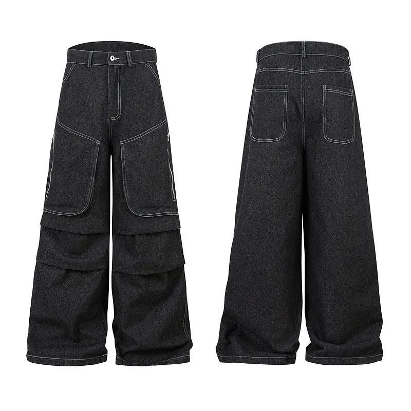 Black multi-pocket pleated workwear jeans made from cotton denim on a plain background.