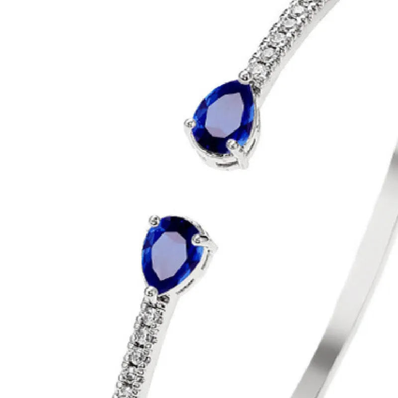 Copper bracelet with inlaid white or blue zircon crystals, simple fashion jewellery design
