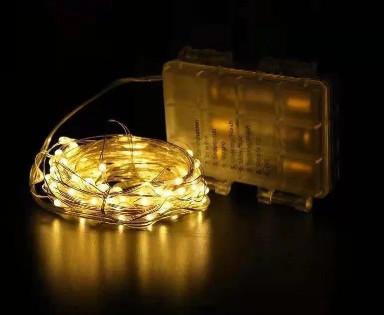 12-metre long copper wire LED string lights with 120 bulbs, shown in one of nine available colours.