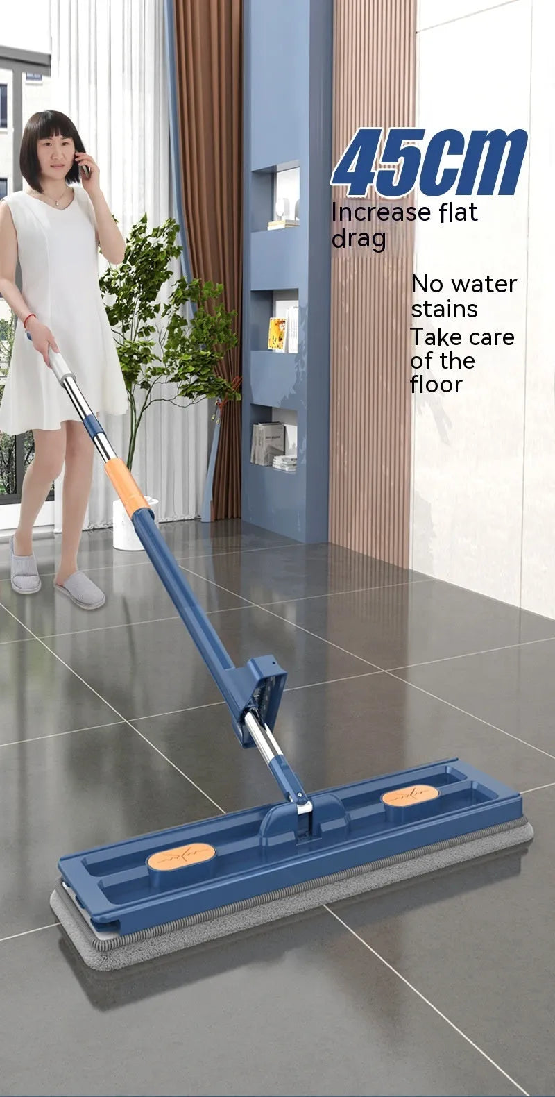Large flat mop with long stainless steel handle and blue cloth on hard floor