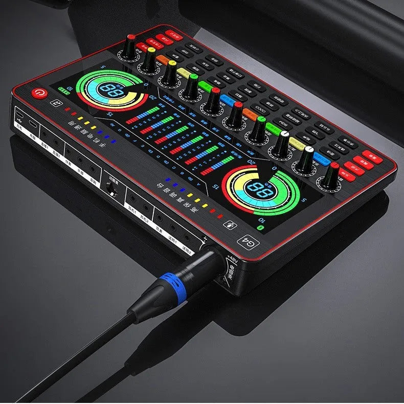 G4 professional sound card set with mixer, large diaphragm microphone, remote control, and audio cables on a desk.