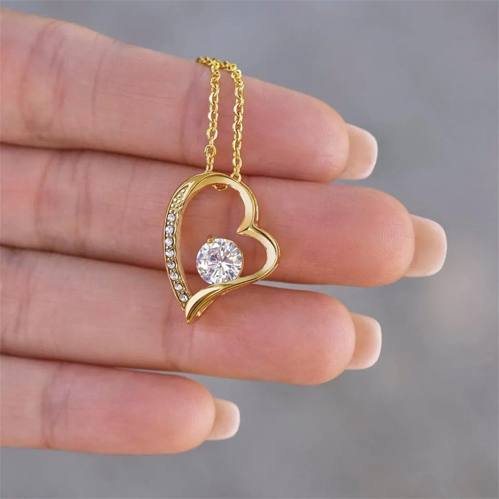 Hollow heart necklace in silver or gold finish with European styling and gift box packaging