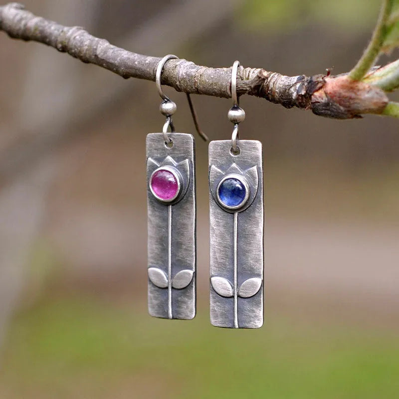 Antique finish red sapphire earrings with geometric shape and ellipse elements in retro style