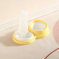 Grey and yellow dual ceramic pet feeding bowl with stainless steel insert and non-slip base.